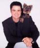 Celebrities and small dogs.-posed_w_spike_sm-1-.jpg